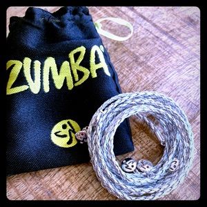 Zumba silver necklace/bracelet. New with pouch